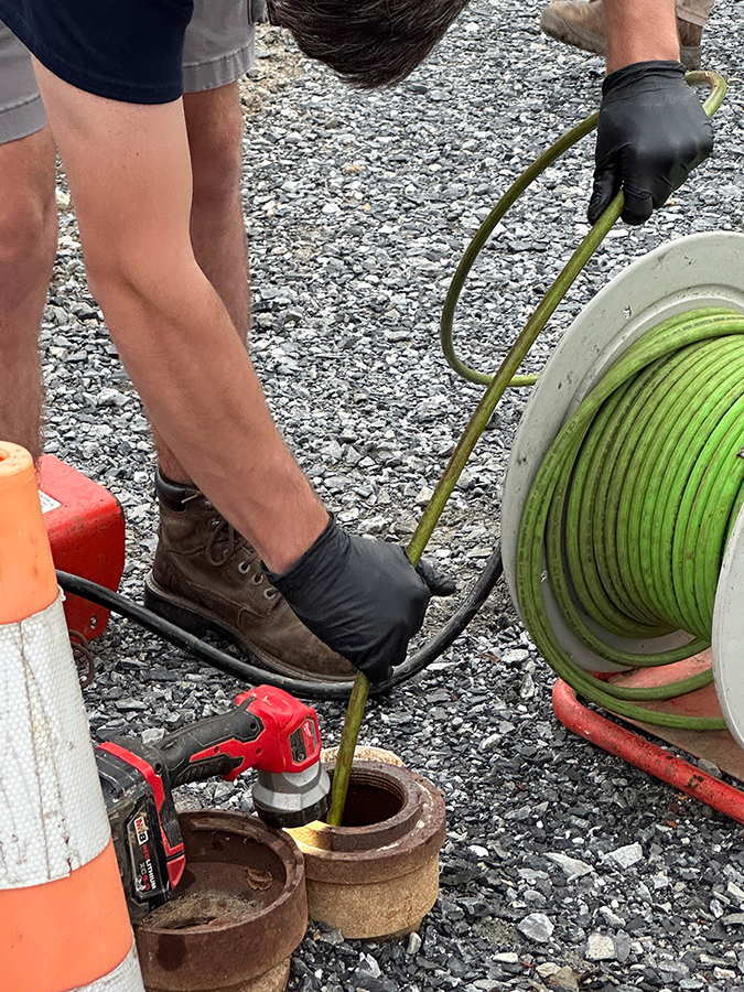 Ranck technician camera and jetting a sewer drain